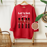 NUTCRACKER SWEATSHIRT | RED SWEATSHIRT WITH BROWN TEXT LET’S GET CRACKING AND BLACK NUTCRACKER SOLDIERS