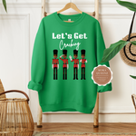 NUTCRACKER SWEATSHIRT | GREEN SWEATSHIRT WITH BROWN TEXT LET’S GET CRACKING AND BLACK NUTCRACKER SOLDIERS