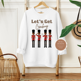 NUTCRACKER SWEATSHIRT | WHITE SWEATSHIRT WITH BROWN TEXT LET’S GET CRACKING AND BLACK NUTCRACKER SOLDIERS